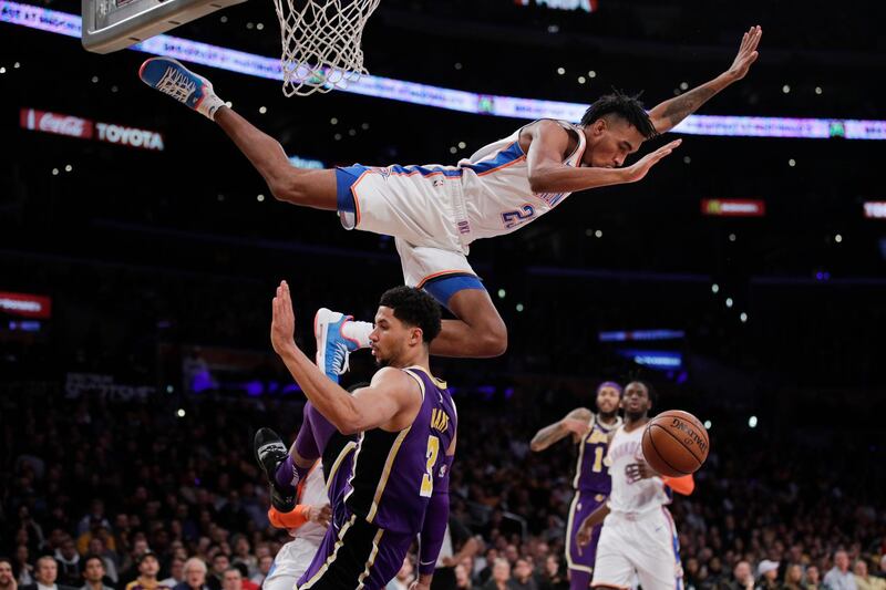 Oklahoma City Thunder's Terrance Ferguson falls towards the court during an NBA basketball game in Los Angeles. AP Photo