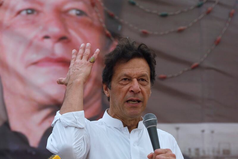 Imran Khan, chairman of the Pakistan Tehreek-e-Insaf (PTI), gestures while addressing his supporters during a campaign meeting ahead of general elections in Karachi, Pakistan, July 4, 2018. REUTERS/Akhtar Soomro