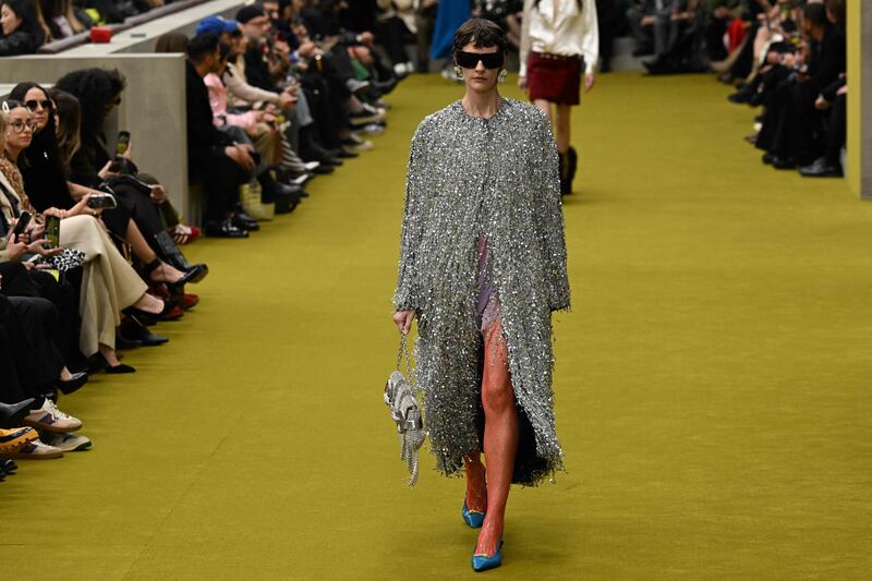 A coat made of strips of metal beading at Gucci. AFP