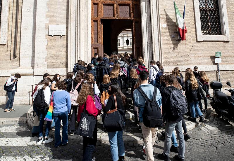 Students enter Visconti High School on the first day of reopening, in Rome, Italy. EPA