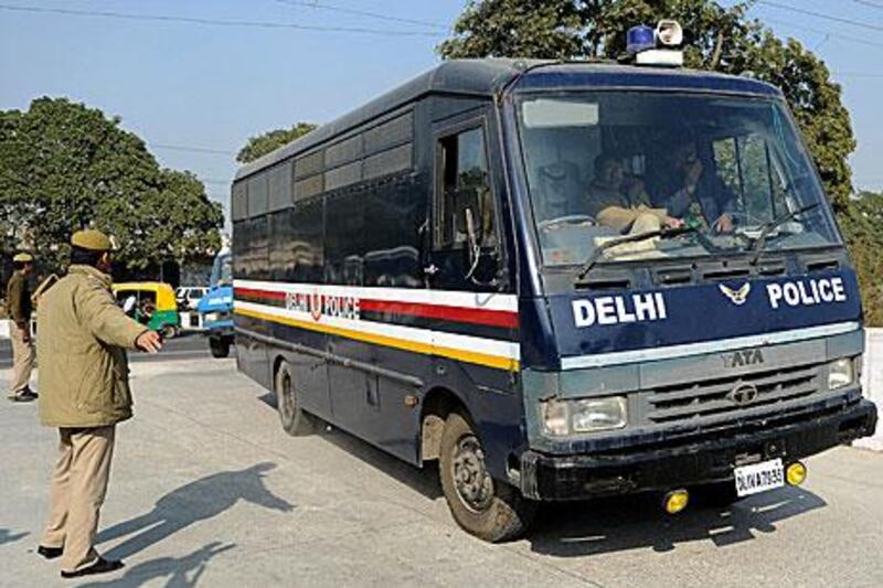 The India gang-rape suspects arrive by prison bus to the New Delhi court for a hearing today.