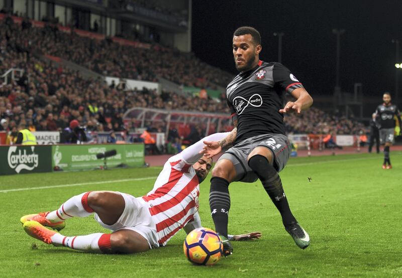 STOKE ON TRENT, ENGLAND - DECEMBER 14:  Glen Johnson of Stoke City (L) tackles Ryan Bertrand of Southampton (R) during the Premier League match between Stoke City and Southampton at Bet365 Stadium on December 14, 2016 in Stoke on Trent, England.  (Photo by Michael Regan/Getty Images)
