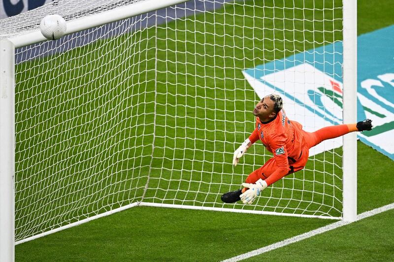 PSG goalkeeper Keylor Navas attempts to make a save.