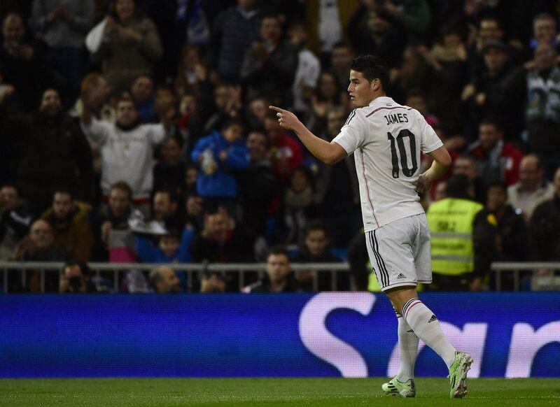 Real Madrid's James Rodriguez celebrates after scoring in Madrid's 5-0 Copa del Rey second leg victory on Tuesday night at the Santiago Bernabeu. Pierre-Philippe Marcou / AFP / December 2, 2014  