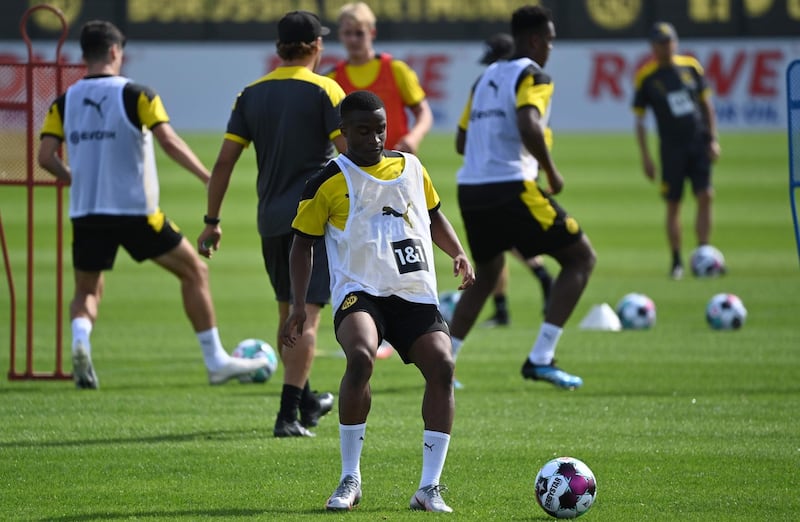 Borussia Dortmund’s Youssoufa Moukoko, centre, during training. AFP