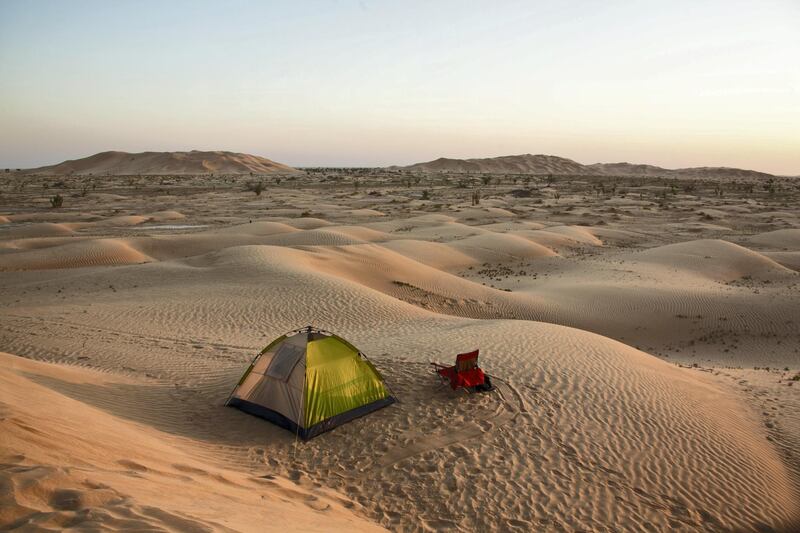 "Tent in the Rub al Khali desert Oman during sunset,"
