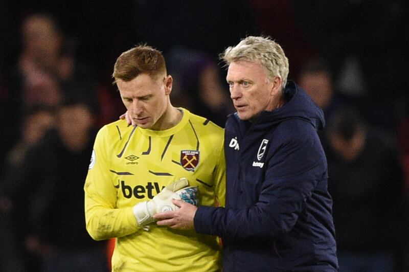 West Ham United's Scottish manager David Moyes (R) consoles West Ham United's English goalkeeper David Martin (L) at the end of the English Premier League football match between Sheffield United and West Ham United at Bramall Lane in Sheffield, northern England on January 10, 2020. RESTRICTED TO EDITORIAL USE. No use with unauthorized audio, video, data, fixture lists, club/league logos or 'live' services. Online in-match use limited to 120 images. An additional 40 images may be used in extra time. No video emulation. Social media in-match use limited to 120 images. An additional 40 images may be used in extra time. No use in betting publications, games or single club/league/player publications.
 / AFP / Oli SCARFF                           / RESTRICTED TO EDITORIAL USE. No use with unauthorized audio, video, data, fixture lists, club/league logos or 'live' services. Online in-match use limited to 120 images. An additional 40 images may be used in extra time. No video emulation. Social media in-match use limited to 120 images. An additional 40 images may be used in extra time. No use in betting publications, games or single club/league/player publications.
