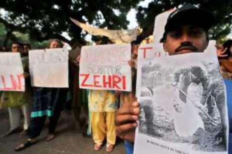 Pakistani human rights activists hold a protest in Karachi on September 1, 2008, over honour killing. Pakistani police have arrested four suspects and launched an investigation into the deaths of three women thought murdered in the name of family honour last month in Babakot village, 450 kilometres southeast of Quetta, for marrying men of their choice. More than 4,000 people, mostly women, have been killed in conservative rural areas of Pakistan in recent years in the name of family honour.   AFP PHOTO/Asif HASSAN *** Local Caption ***  210996-01-08.jpg