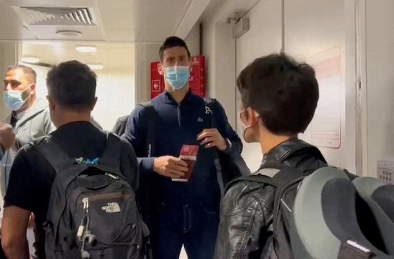 Novak Djokovic seen walking through Dubai International Airport shortly after arriving from Melbourne. Reuters