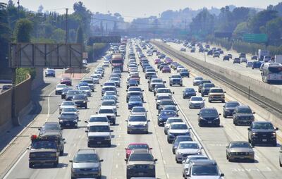 Auto traffic flows in and out of Los Angeles, California, one of the worst traffic-congested cities in the country, on August 28, 2018. - Shares of big US automakers rose on news the US and Mexico reached a deal to update the 25-year North American Free Trade Agreement, pending Congressional approval. (Photo by Frederic J. BROWN / AFP)