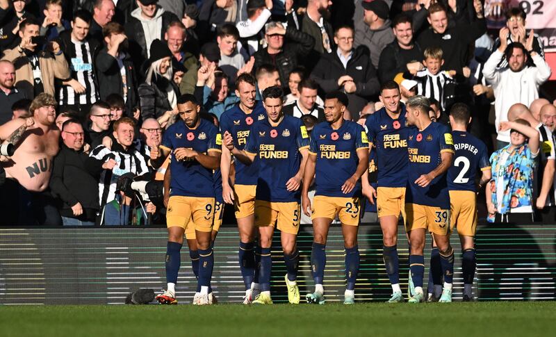 Newcastle players celebrate after Miguel Almiron's goal. Reuters