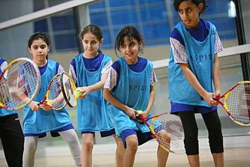 Young girls participate in a sports class at the Aspire Academy in Sport City, Doha, Qatar. The Academy invites different schools to come and exercise and use the facilities. Randi Sokoloff / The National