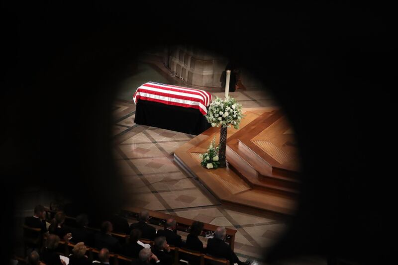 The casket of John McCain sits in the nave during the funeral service at the National Cathedral. Getty Images/ AFP