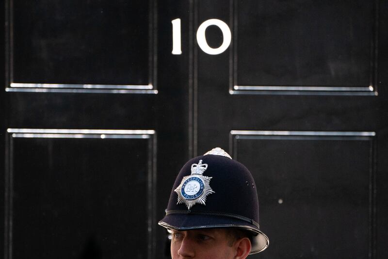 A Metropolitan Police officer stands outside 10 Downing Street in London. PA