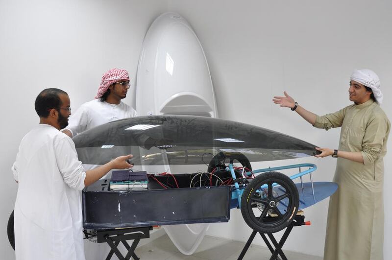 Engineering students from one of the UAE teams working on their car for the 2014 Taqa GCC Hybrid-Electric Challenge. Courtesy Arman Molki