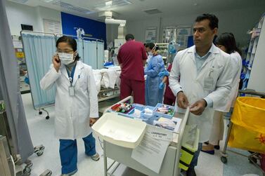 Doctors treat a patient in the trauma centre at Rashid hospital. Jaime Puebla / The National