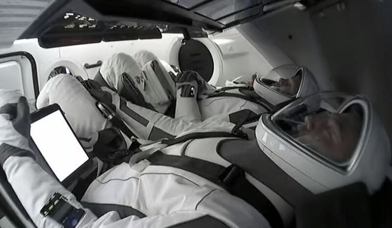 The crew inside the Dragon capsule. Photo: SpaceX 