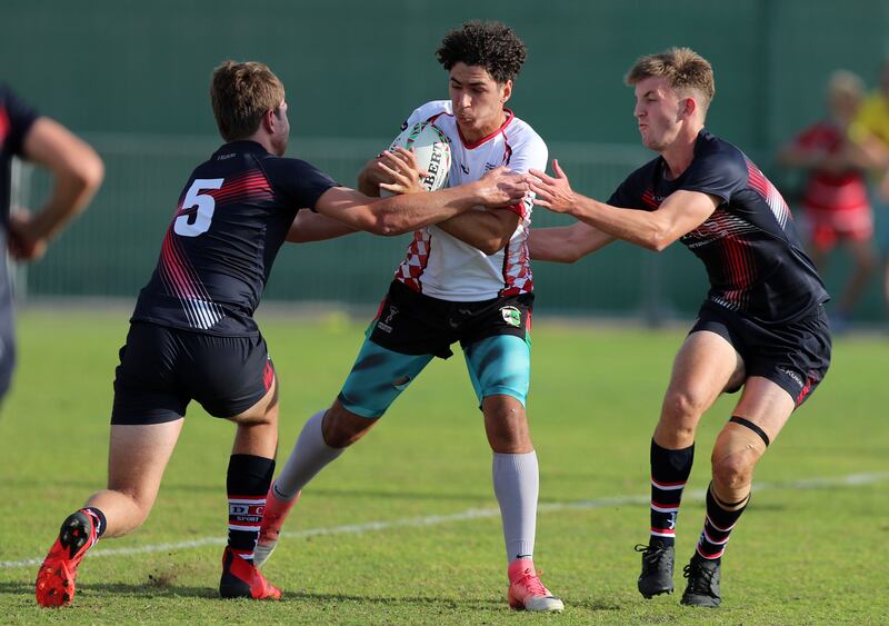 Dubai College, in black at the Rugby Sevens on December 2, 2021, was named best British curriculum school. Chris Whiteoak / The National