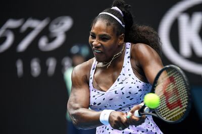 (FILES) In this file photo taken on January 24, 2020 Serena Williams of the US hits a return against China's Wang Qiang during their women's singles match on day five of the Australian Open tennis tournament in Melbourne. Williams said on August 8, 2020, she is pressing ahead with plans to play in the US Open despite a wave of player withdrawals from the upcoming Grand Slam event over coronavirus fears.

 - IMAGE RESTRICTED TO EDITORIAL USE - STRICTLY NO COMMERCIAL USE
 / AFP / William WEST / IMAGE RESTRICTED TO EDITORIAL USE - STRICTLY NO COMMERCIAL USE
