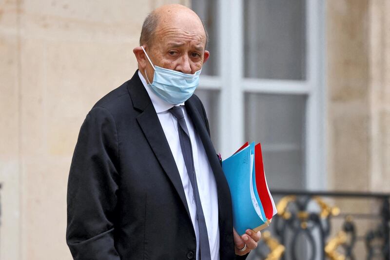 French European and Foreign Affairs Minister Jean-Yves Le Drian wearing a face mask leaves after attending the weekly cabinet meeting at the Elysee Palace in Paris, on November 10, 2020. (Photo by Ludovic MARIN / AFP)