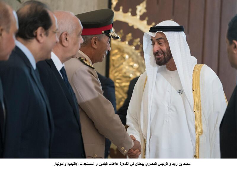 Sheikh Mohamed bin Zayed Al Nahyan Crown Prince of Abu Dhabi Deputy Supreme Commander of the UAE Armed Forces greets a guest at the Heliopolis Palace. Crown Prince Court - Abu Dhabi 
---
