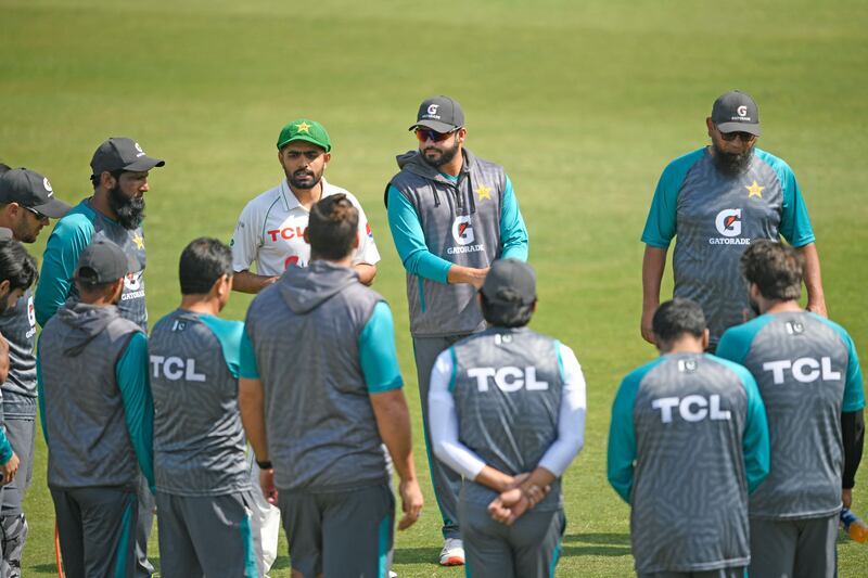 Pakistan's captain Babar Azam, third left, speaks with teammates prior to a practice session at the Rawalpindi Cricket Stadium. AFP
