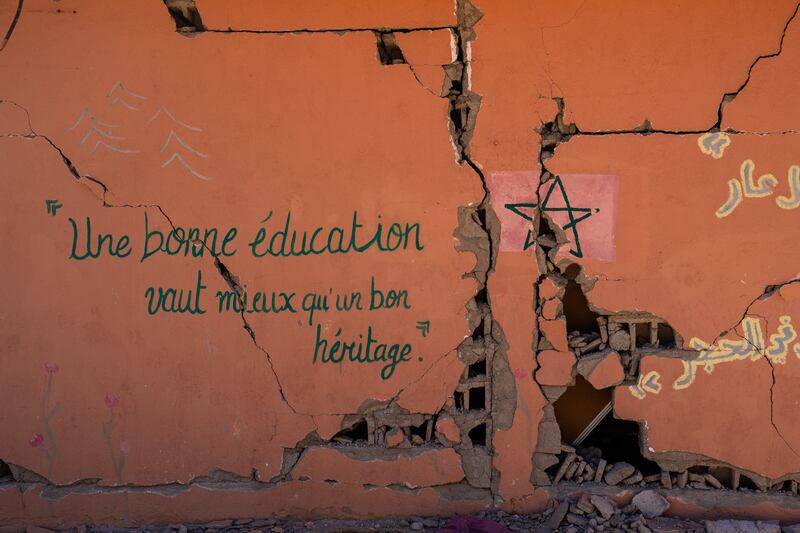 Large cracks in the wall of a school in Ardouz. Getty Images