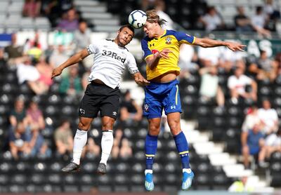 Soccer Football - Pre Season Friendly - Derby County v Southampton - Pride Park, Derby, Britain - July 21, 2018   Derby County's Mason Bennett in action with Southampton's Jannik Vestergaard   Action Images via Reuters/Ed Sykes