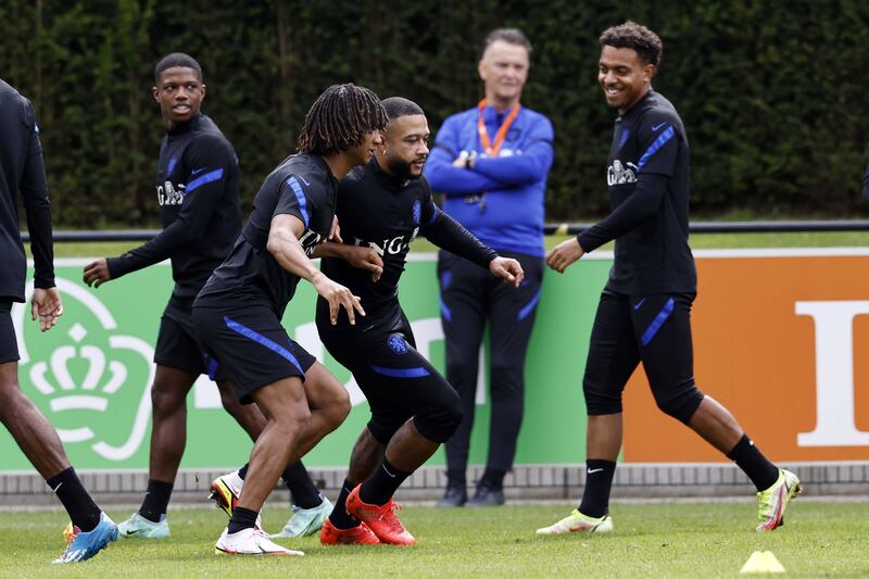 Left to right: Tyrell Malacia, Nathan Ake, Memphis Depay, manager Louis van Gaal and Donyell Malen. EPA