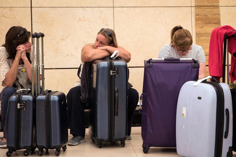 Passengers stranded in Sharm el Sheikh International Airport after flights were halted on security grounds. Vinciane Jacquet / AP