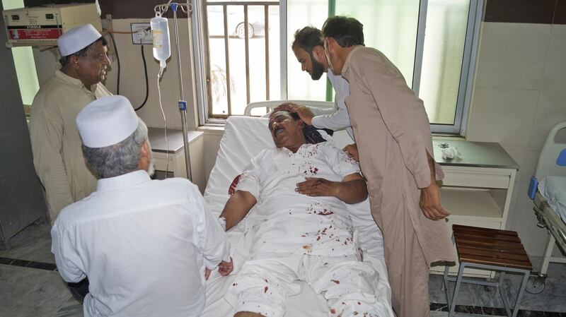 epa06903915 A man who was injured in a suicide bomb attack that targeted Ikram Gandapur, a candidate of Pakistan Tehrik-e-Insaf, for general elections, receives medical treatment at a hospital in Dera Ismail Khan, Pakistan, 22 July 2018. Pakistan is set to hold general and provincial elections on 25 July with around 105 million people registered to vote, according to the election commission.  EPA/SAOOD REHMAN