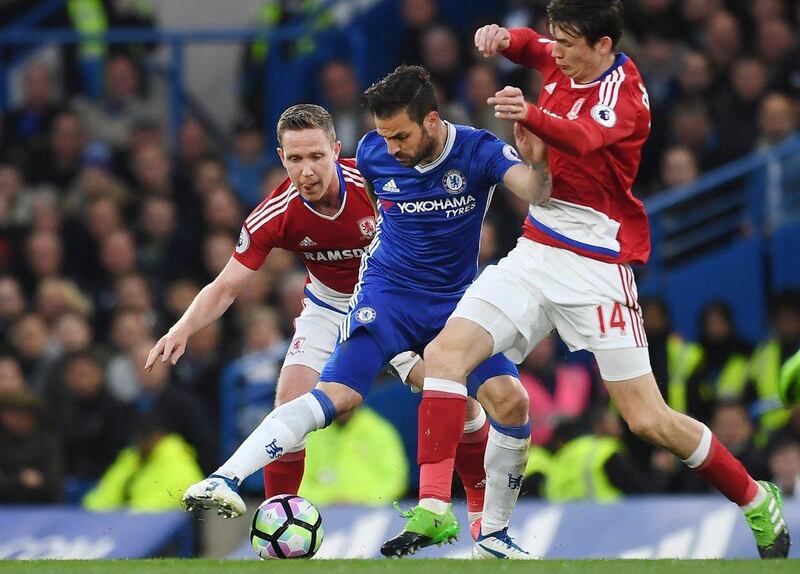 Cesc Fabregas, centre, pulled the strings in midfield to lead Chelsea to a 3-0 win over Middlesbrough on Monday. Andy Rain / EPA