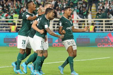 Palmeiras' players celebrate their opening goal during the 2021 FIFA Club World Cup football match between Egypt's Al-Ahly and Brazil's Palmeiras at al-Nahyan Stadium in Abu Dhabi, on February 8, 2022. (Photo by Karim SAHIB / AFP)