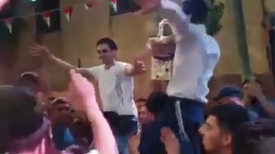  The four settlers dancing at an Arab wedding that prompted outrage among Palestinians. YouTube screengrab.