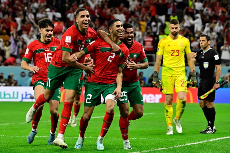 Morocco players celebrate the win. AFP