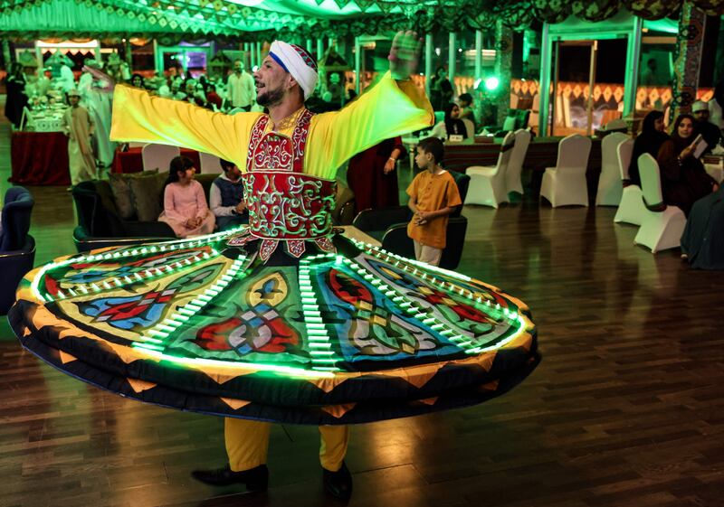 An Egyptian dancer performs the traditional tanoura dance at a restaurant in the Omani capital Muscat. AFP