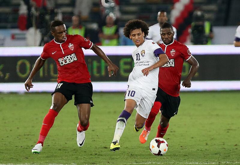 Omar Abdulrahman of Al Ain, centre, could hear his name chanted by the crowd throughout his club's 1-0 win over Al Ahli to take the President's Cup on May 18, 2014. Pawan Singh / The National