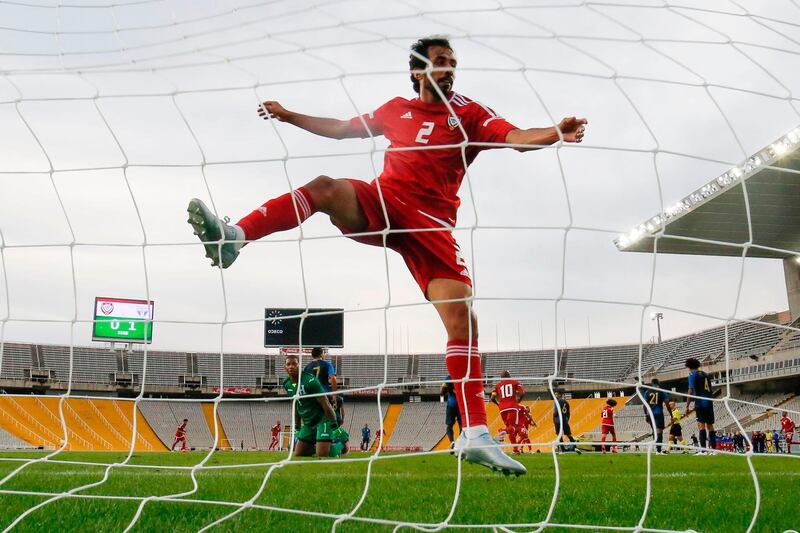 UAE´s defender Mohamed Al-Minhali jumps after UAE's midfielder Omar Abdulrahman scored during a friendly football match between United Arab Emirates and  Honduras at the Estadi Olimpic Lluis Companys in Barcelona. AFP