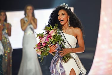 FILE - Miss North Carolina Cheslie Kryst wins the 2019 Miss USA final competition in the Grand Theatre in the Grand Sierra Resort in Reno, Nev. , on May 2, 2019.  Kryst, a correspondent for the entertainment news program "Extra," has died.  Police said the 30-year-old Kryst jumped from a Manhattan apartment building.  She was pronounced dead at the scene Sunday morning, Jan.  30, 2022.  Her family confirmed her death in a statement.  (Jason Bean / The Reno Gazette-Journal via AP, File)