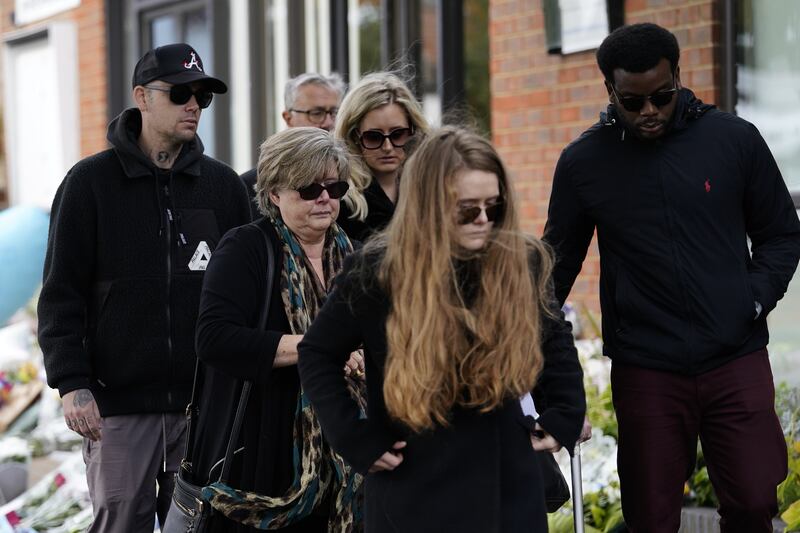 Julia Amess (second left), the widow of Conservative MP Sir David Amess, arrives at Belfairs Methodist Church to read tributes left to her late husband. PA