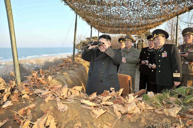 The test came as a surprise as leader Kim Jong-un, left, did not mention the Pyongyang’s nuclear weapons in his New Year’s speech. KCNA via KNS / AFP Photo