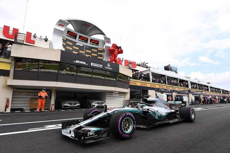 Mercedes' British driver Lewis Hamilton drives in the pits during the qualifying session at the Circuit Paul Ricard in Le Castellet, southern France, on June 23, 2018, ahead of the Formula One Grand Prix de France. / AFP / POOL / Boris HORVAT                        
