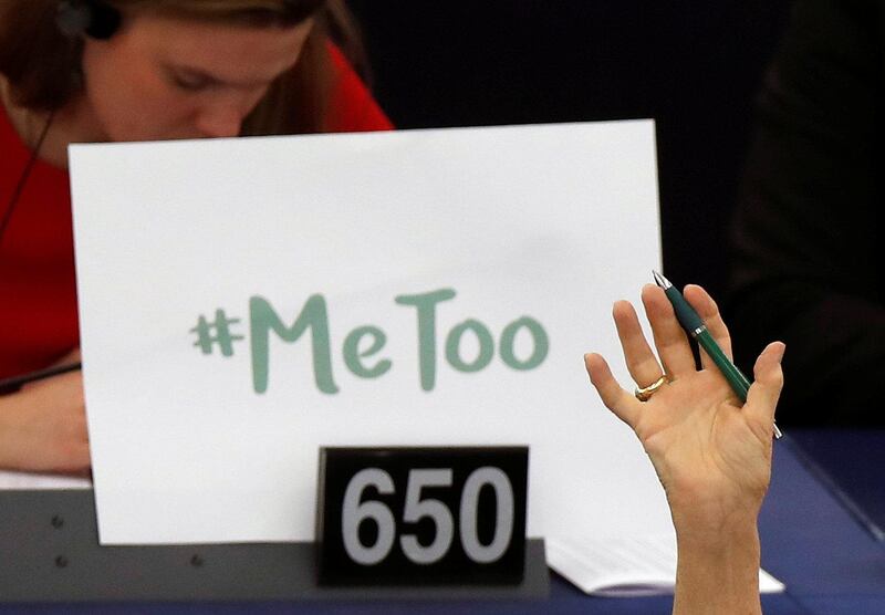 A placard with the hashtag "MeToo" is seen on a European Parliament member's desk during a voting session after a debate to discuss preventive measures against sexual harassment and abuse in the EU at the European Parliament in Strasbourg, France, October 25, 2017.  REUTERS/Christian Hartmann