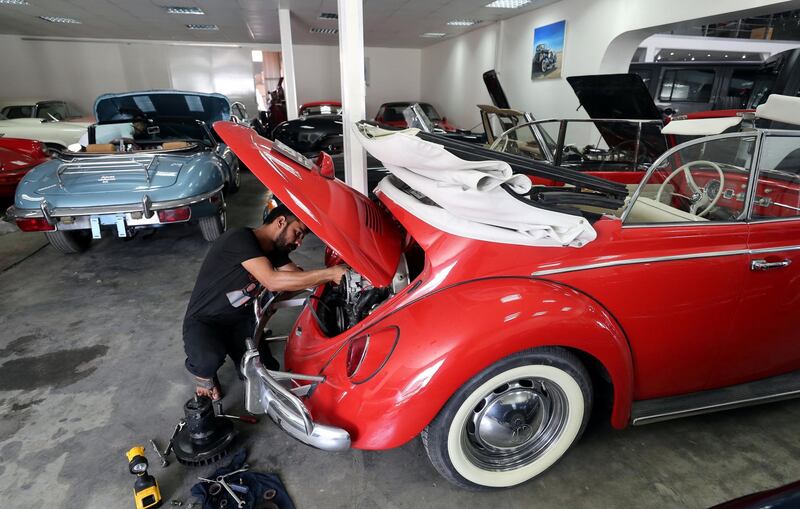 Dubai, United Arab Emirates - June 11th, 2018: Photo project. Nawaz Ali fixes and restores a 1965 VW Beatle Cabriolet at Jeepers Auto Mechanical / Classic Cars Dubai. Monday, June 9th, 2018 Al Quoz, Dubai. Chris Whiteoak / The National