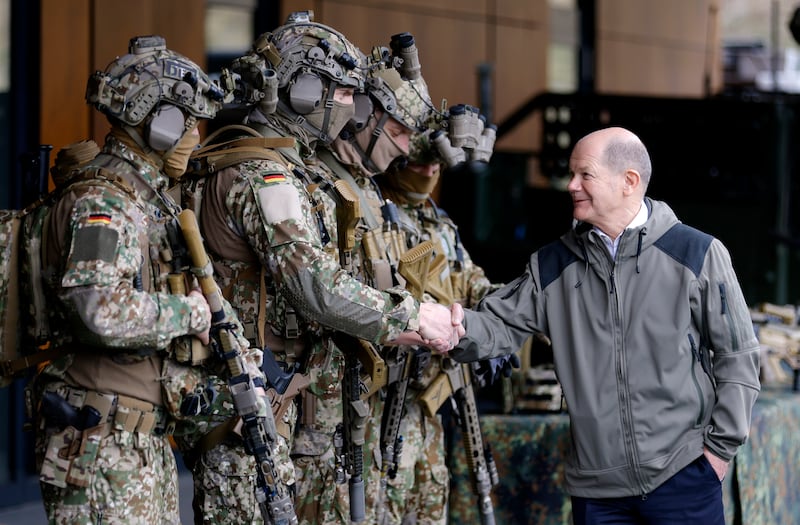 German Chancellor Olaf Scholz meets soldiers in Calw. He has called for an investigation into a leaked audio recording of military officials discussing the Ukraine war. EPA