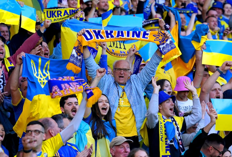 Ukraine fans celebrate. PA
