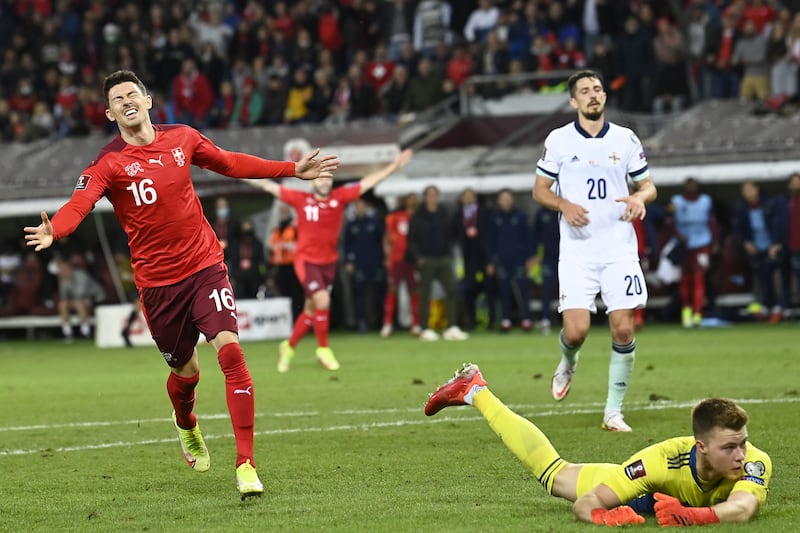 October 9, 2021. Switzerland 2 (Zuber 45+3' Fassnacht  90+1') Northern Ireland 0: Two injury-time goals at the end of each half earned Switzerland a vital three points against opponents who were reduced to 10 men in the first half. Switzerland attacker Xherdan Shaqiri said: "We knew it was going to be a tough game because Northern Ireland are defensively a good team. After the red card the game opened up and it was more simple for us to play and create chances." PA