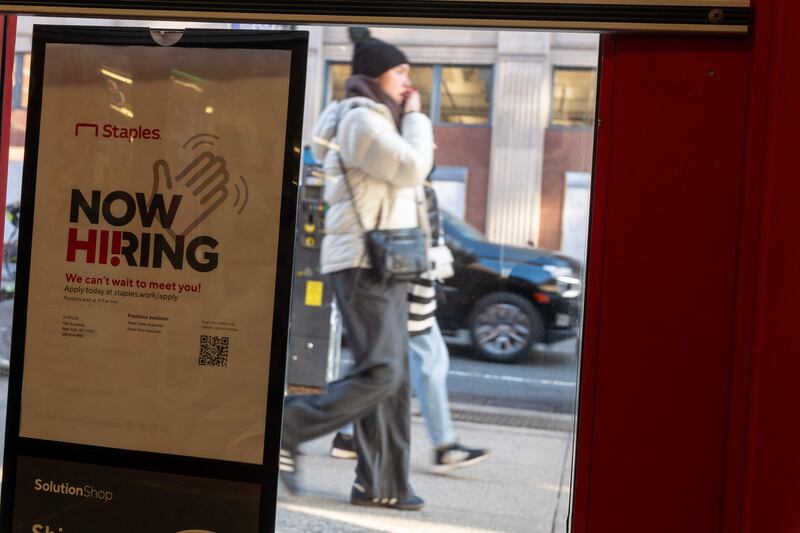 A recruitment sign in New York. US employers were expected to add 185,000 jobs in January. AFP