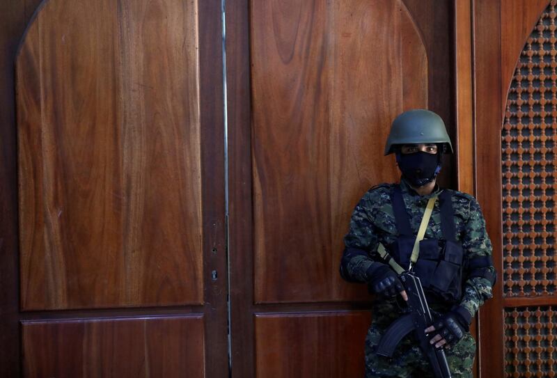 A Houthi soldier stands guard outside a Houthi-led government meeting on the coronavirus in Sanaa, Yemen March 14, 2020. REUTERS/Khaled Abdullah
