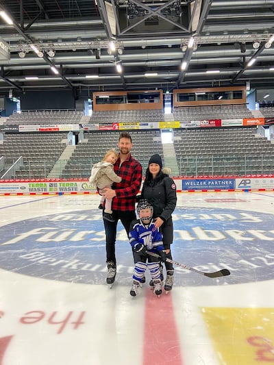Colleen Robak, husband Colby with their two children. The Robaks will be returning to Canada when Colby's hockey season in Germany ends. Courtesy of Colleen Robak
